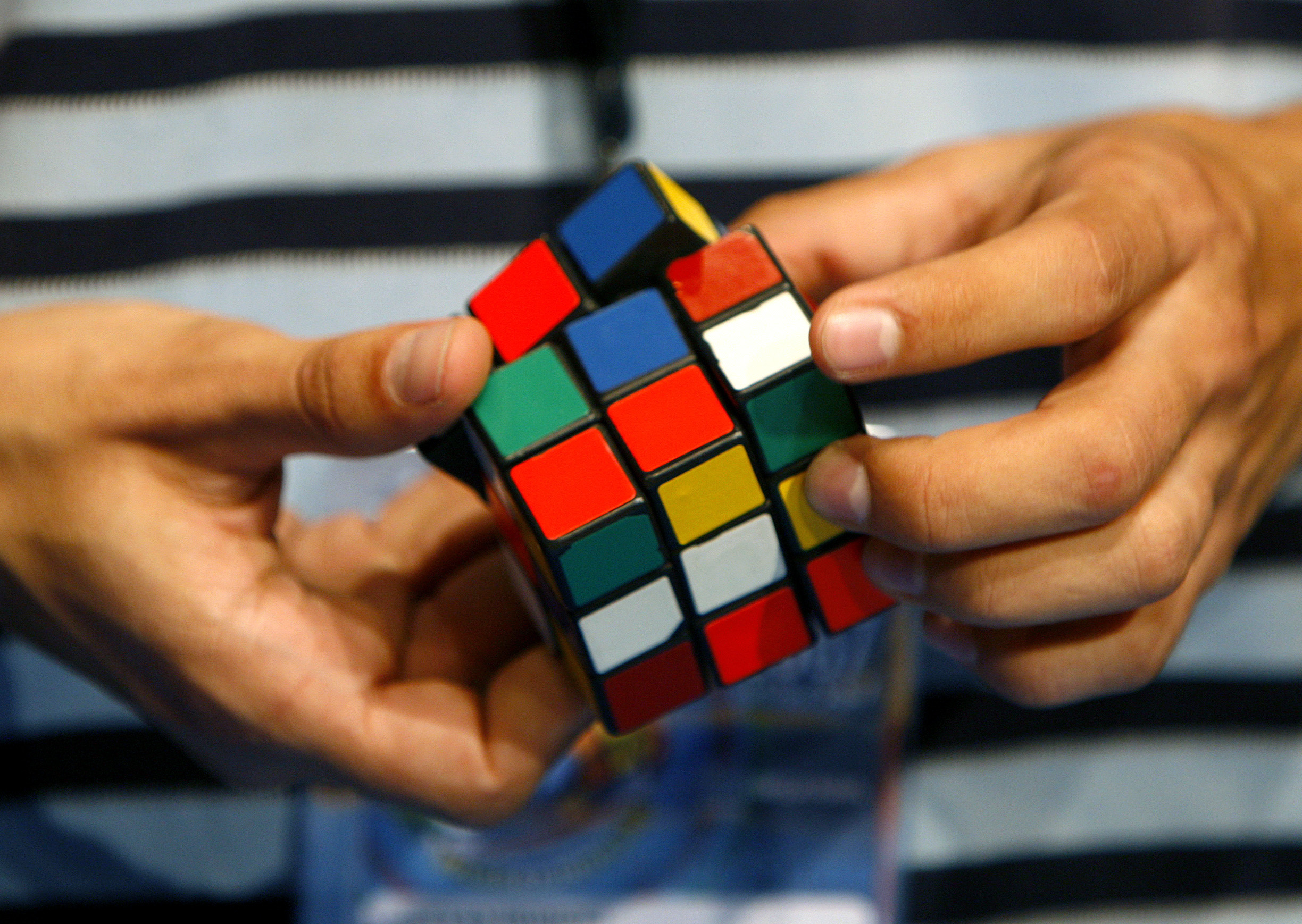 A competitor attends the World Rubik's Cube Championship in Budapest October 5, 2007. REUTERS/Laszlo Balogh (HUNGARY) - RTR1ULWR